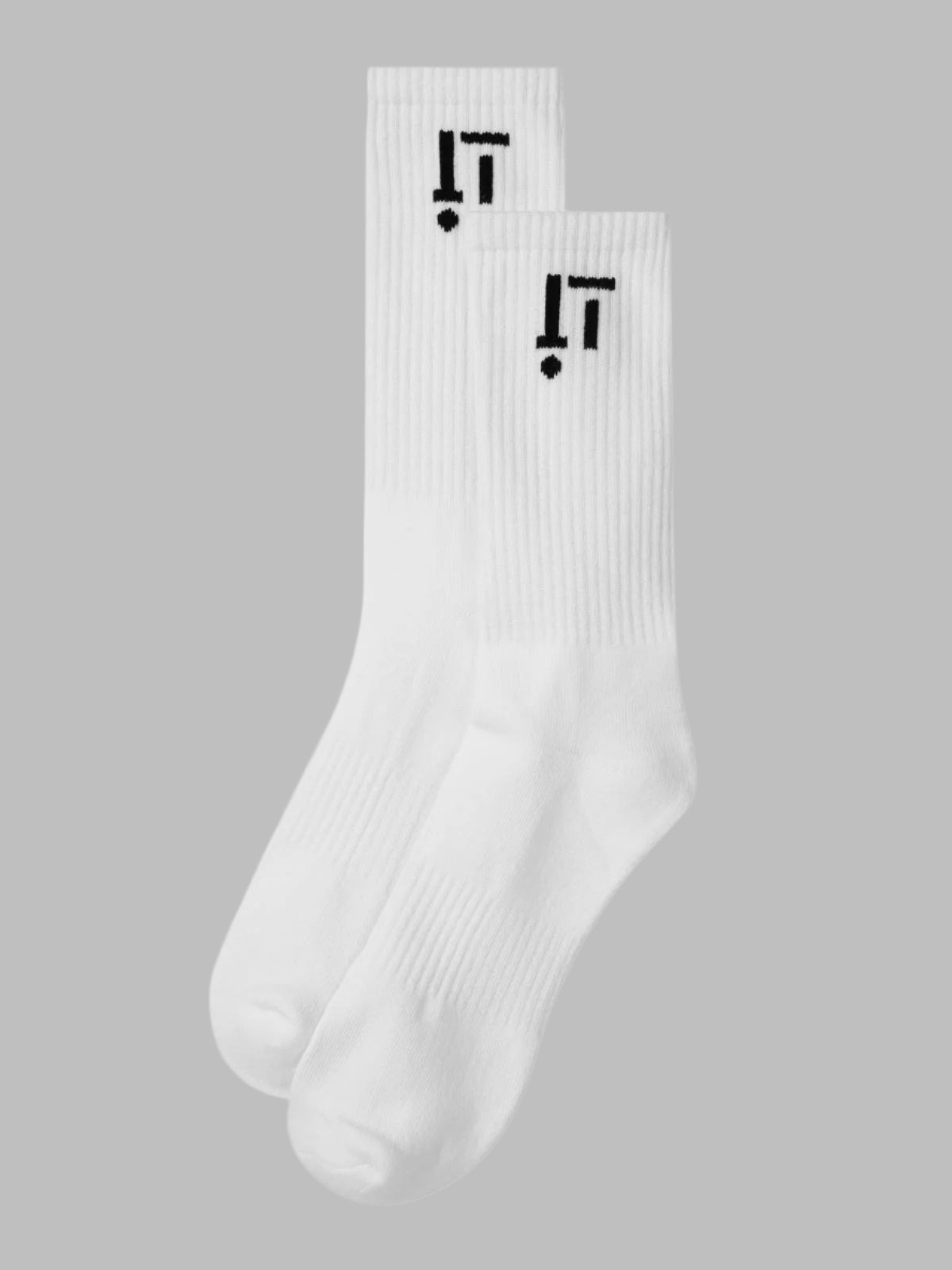 White socks with black logo on a gray background